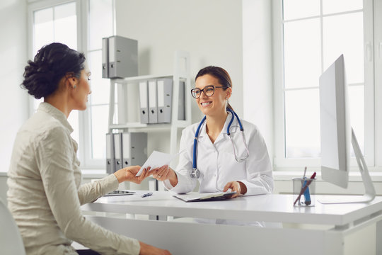 Doctor consulting with a patient about physician-supervised GLP-1 weight loss treatment